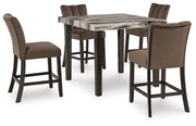 Ashley Furniture Jeshina dining room set with a wooden table and matching chairs in a modern dining space.