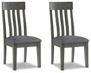 Ashley Furniture Hallanden dining room set with a wooden table and matching chairs in a modern kitchen setting.