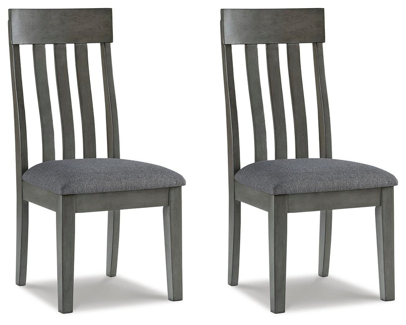 Ashley Furniture Hallanden dining room set with a wooden table and matching chairs in a modern kitchen setting.