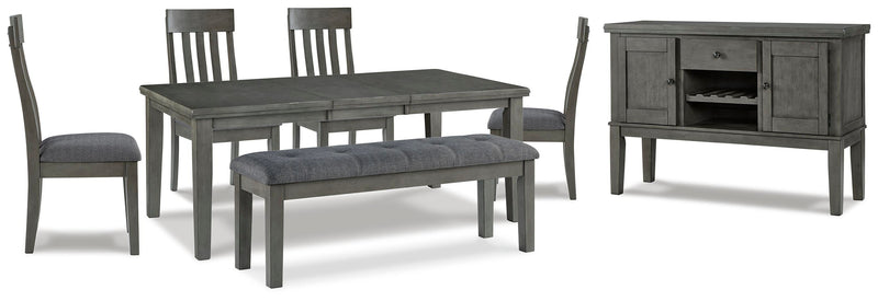Ashley Furniture Hallanden dining room set with a wooden table and matching chairs in a modern dining space.