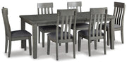 Ashley Furniture Hallanden dining room set with a table and four chairs in a modern wood finish.