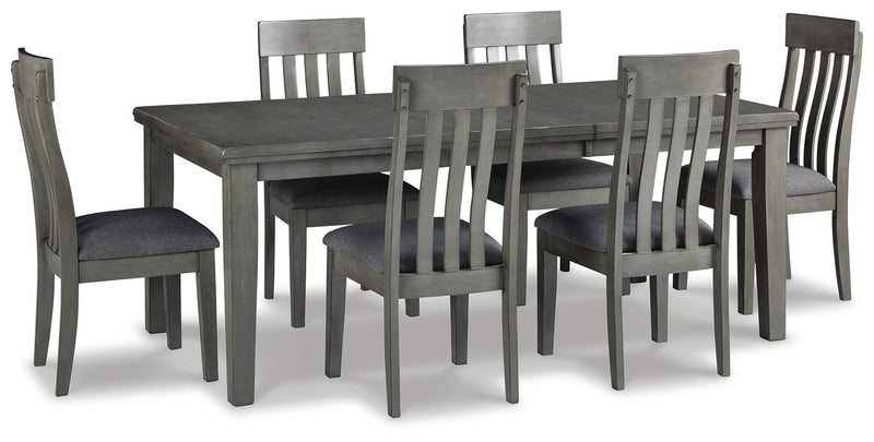 Ashley Furniture Hallanden dining room set with a table and four chairs in a modern wood finish.