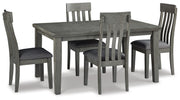Ashley Furniture Hallanden dining room set with a wooden table and matching chairs, shown in a modern dining space.