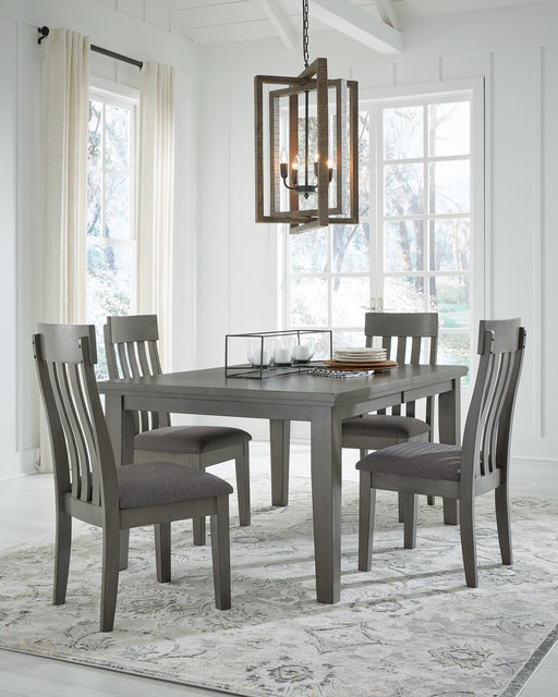 Ashley Furniture Hallanden dining room set with a table and four chairs, featuring a modern wood finish and sleek design.