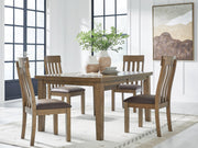 Ashley Furniture Urbinforte dining room set with a wooden table and matching chairs, featuring a leaf-shaped design and modern style.