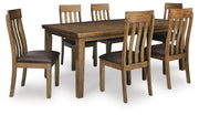 Ashley Furniture Urbinforte dining room set with a wooden table and matching chairs, sleek modern design for dining space.