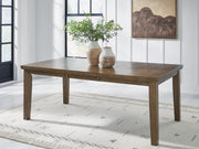 Ashley Furniture Urbinforte dining room set with a wooden table and matching chairs, shown in a modern dining space.