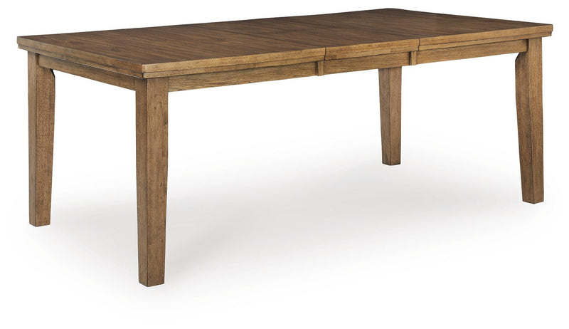 Ashley Furniture Urbinforte dining room set with a large table and six upholstered chairs, seen from an angled perspective.