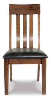 Ashley Furniture Ralene dining chair set with cushioned seats and wooden legs, shown from a head-on angle.