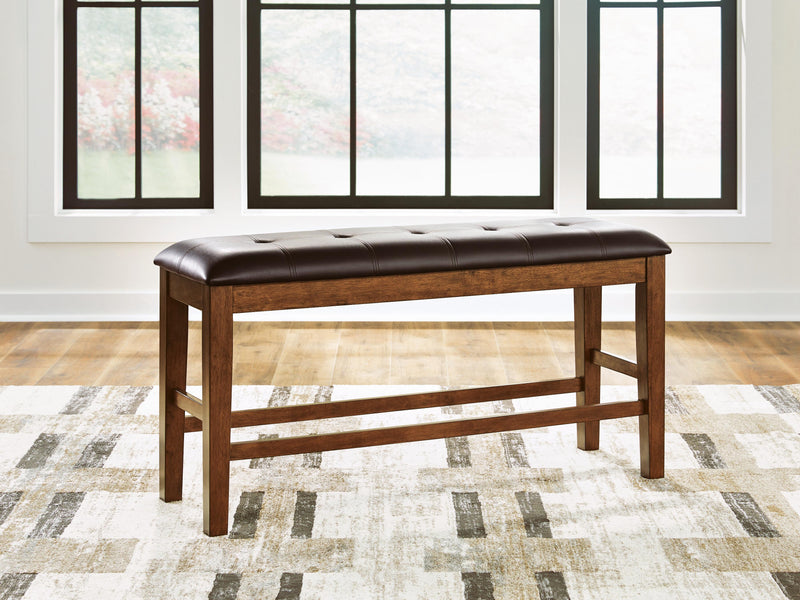 Ashley Furniture Ralene counter height dining bench with wooden seat and metal legs, ideal for kitchen or dining room.
