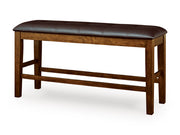 Ashley Furniture Ralene counter height dining bench with wood finish, angled design, and cushioned seating for kitchen or dining area.