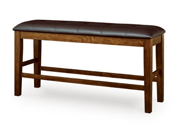 Ashley Furniture Ralene counter height dining bench with wood finish, angled design, and cushioned seating for kitchen or dining area.