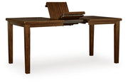 Ashley Furniture Ralene counter height dining extension table with leaf, showing angled view of wood tabletop and extendable leaf