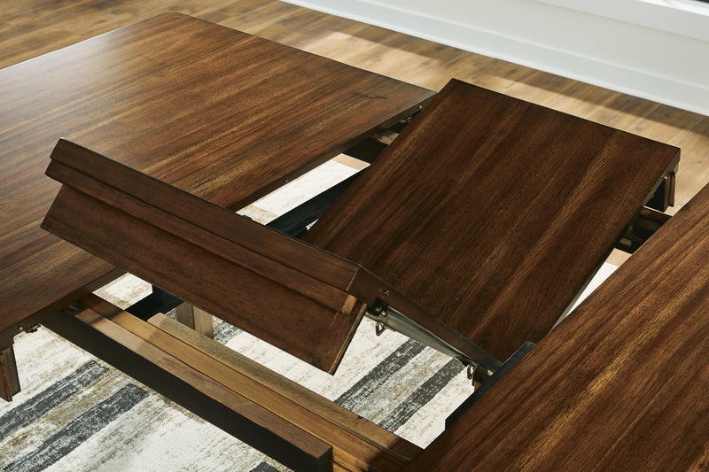 Ashley Furniture Ralene counter height dining table with extension leaf, showcasing the table's wood finish and detailed leaf mechanism.