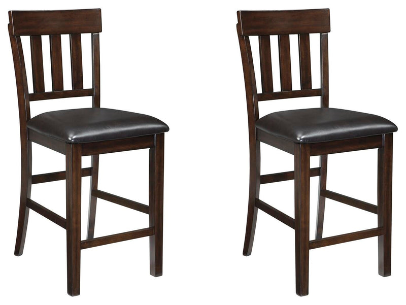 Ashley Furniture Haddigan barstool set with four modern wooden stools featuring cushioned seats and sleek design.