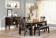 Ashley Furniture Haddigan dining bench with wood finish and upholstered seat, shown in a modern dining room setting.