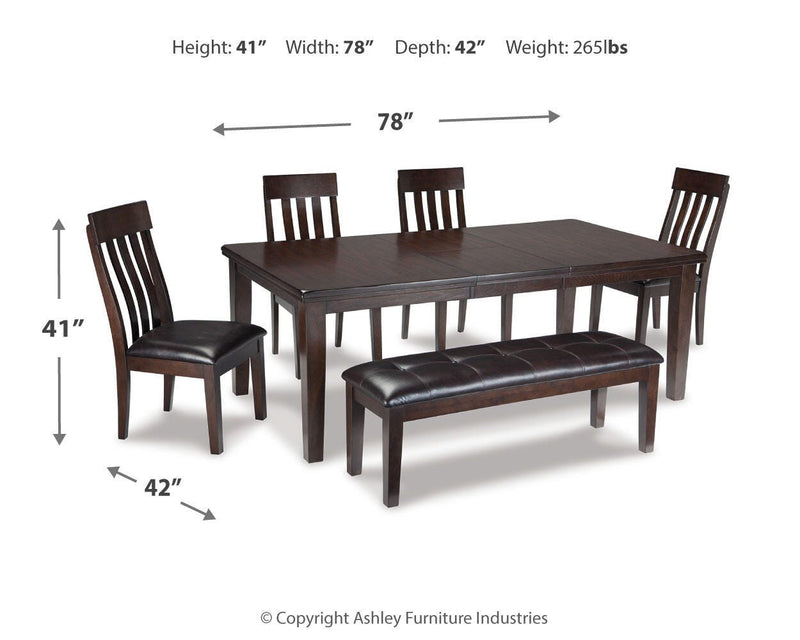 Ashley Furniture Haddigan dining room set with a wooden table and matching chairs, featuring a classic design.