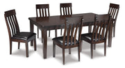 Ashley Furniture Haddigan dining set with a wooden table and six upholstered chairs in a modern dining room setting.