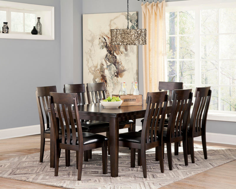 Ashley Furniture Haddigan dining set with a wooden table and six matching chairs, ideal for a modern dining room.