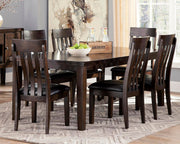 Ashley Furniture Haddigan dining set with rectangular table and six upholstered chairs in a modern dining room setting