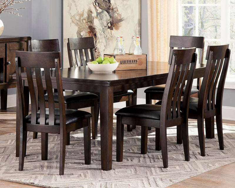 Ashley Furniture Haddigan dining set with rectangular table and six upholstered chairs in a modern dining room setting