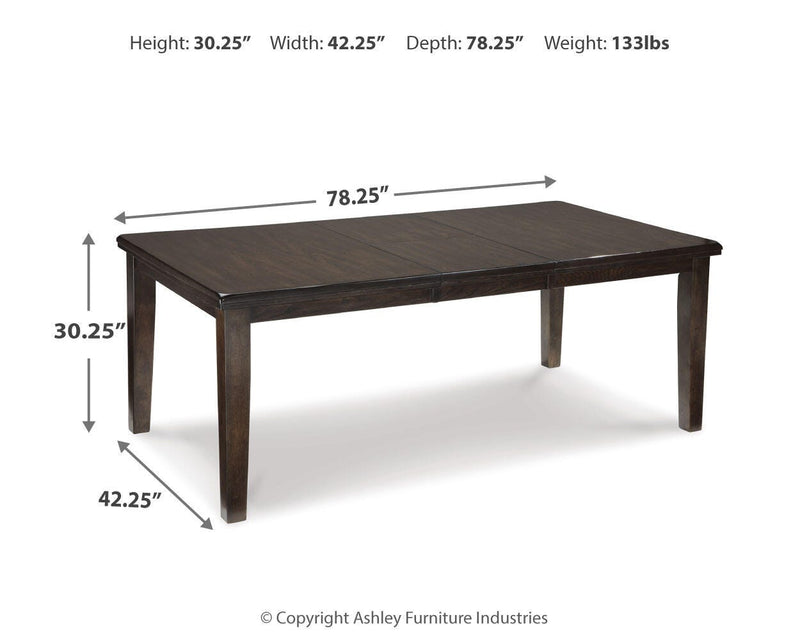 Ashley Furniture Haddigan dining set with a wooden table and matching chairs in a modern dining room setting.