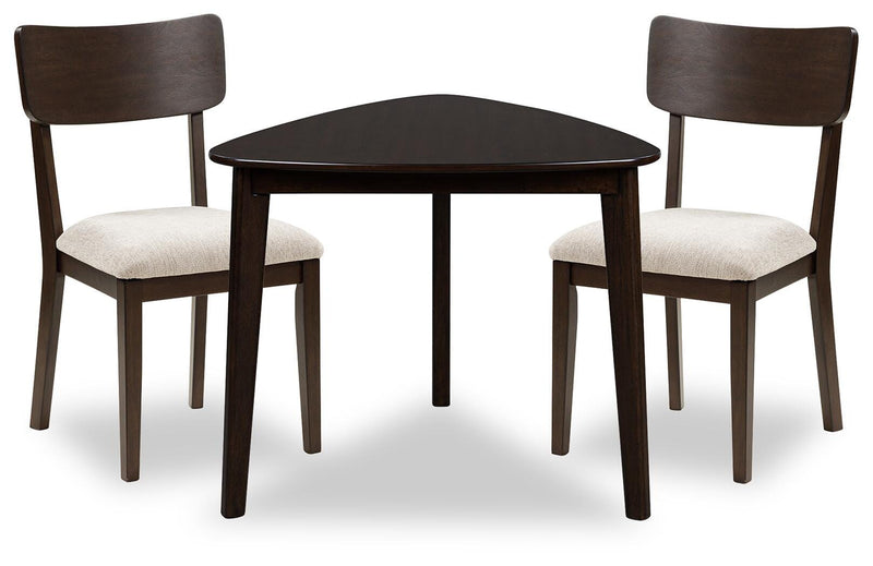 Ashley Furniture Mallenette dining room set with a table and matching chairs, stylish wood finish for elegant dining spaces.
