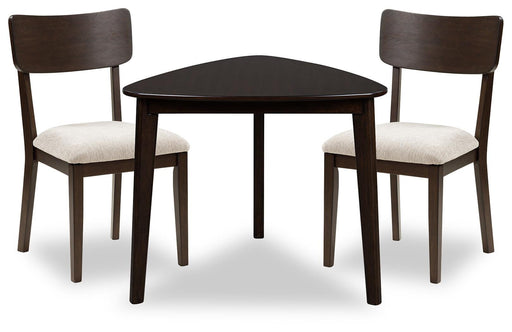 Ashley Furniture Mallenette dining room set with a table and matching chairs, stylish wood finish for elegant dining spaces.
