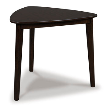 Ashley Furniture Mallenette dining room set with a wooden table and six upholstered chairs, shown from an angled view in a modern dining space.