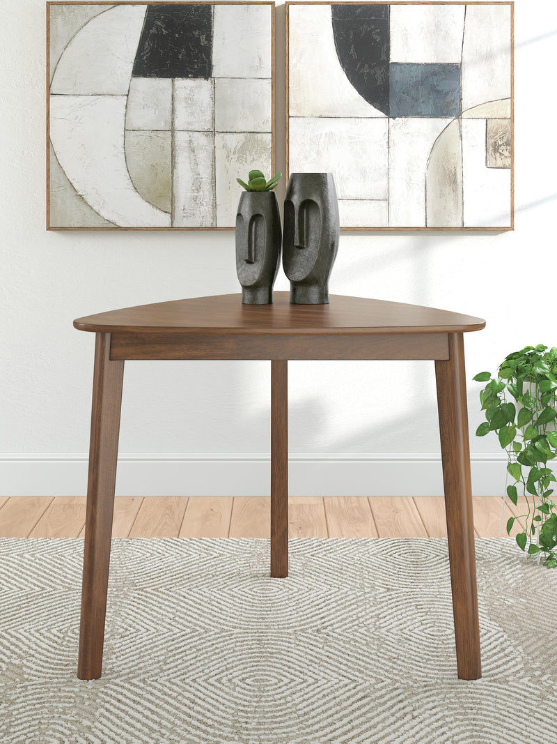 Ashley Furniture Tameride Dining Table with a sturdy wooden surface and sleek design, perfect for modern dining rooms.