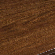 Ashley Furniture Tameride dining table with four matching chairs, showcasing a sleek wooden finish and modern design.