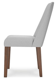 Ashley Furniture Lyncott dining room set with a wooden table and matching chairs, shown from a side angle.