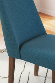Close-up of Ashley Furniture Lyncott dining room set with a wooden table and upholstered chairs, detailed design and craftsmanship.
