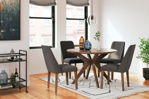 Ashley Furniture Lyncott dining room set with a wooden table and matching chairs in a modern dining space.