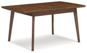 Ashley Furniture Lyncott Dining Extension Table shown from an angled view, showcasing its wooden surface and extendable design.
