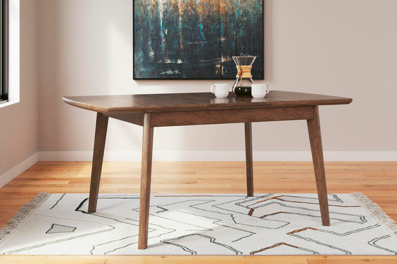 Ashley Furniture Lyncott dining extension table with a sleek wooden surface and sturdy legs, ideal for family meals and gatherings.