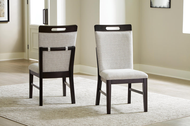 Ashley Furniture Neymorton dining room set with a wooden table and six matching chairs, elegant and modern for a stylish dining space.