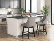 Set of two Neymorton counter height barstools by Ashley Furniture with wood seats and metal frames, ideal for kitchen or bar area.