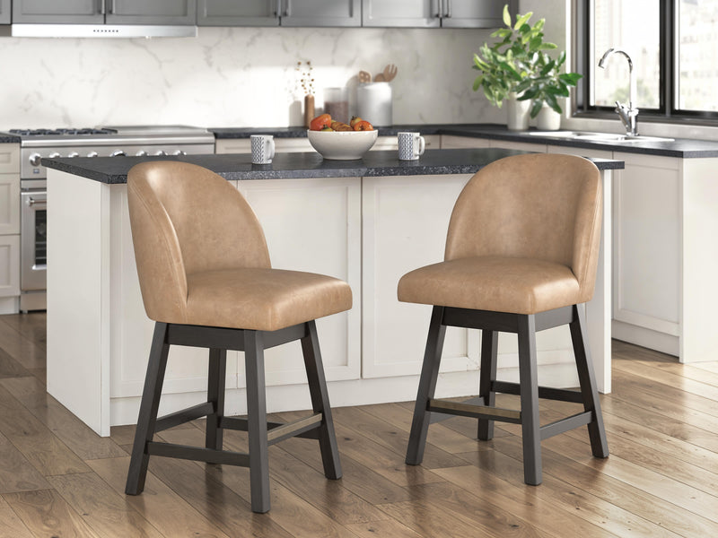 Set of two Ashley Furniture Neymorton counter height barstools with wooden legs and upholstered seats.
