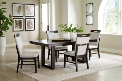 Ashley Furniture Neymorton dining room set with a wooden table and matching chairs, featuring a leaf design on the table surface.