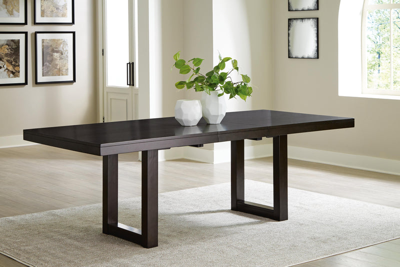 Ashley Furniture Neymorton dining room set with a wooden table and six matching chairs, ideal for family dining spaces.
