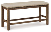 Ashley Furniture Moriville counter height dining set with a wooden table and matching chairs in a modern dining room setting.