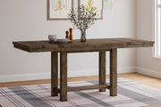 Ashley Furniture Moriville counter height dining set with a wooden table and six matching chairs, in an elegant dining room setting.