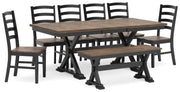 Ashley Furniture Wildenauer casual dining set with wooden table and six cushioned chairs in a modern kitchen setting.