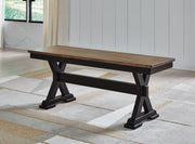 Ashley Furniture Wildenauer casual seating dining set with table and chairs, ideal for outdoor or casual dining spaces.