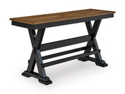 Ashley Furniture Wildenauer 48-inch counter height bench with wooden legs and upholstered seat, angled view.
