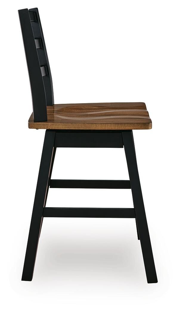 Side view of Ashley Furniture Wildenauer counter height swivel barstool with wooden legs and cushioned seat.