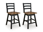Ashley Furniture Wildenauer counter height swivel barstool with wooden legs and a cushioned seat, shown from an angled view.