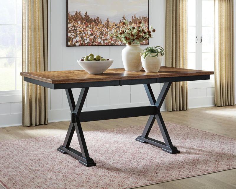 Wildenauer counter height butterfly extension table by Ashley Furniture showing a wood finish and open butterfly leaf extension