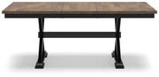 Ashley Furniture Wildenauer casual dining set with table and chairs, featuring a modern, comfortable design for family meals.